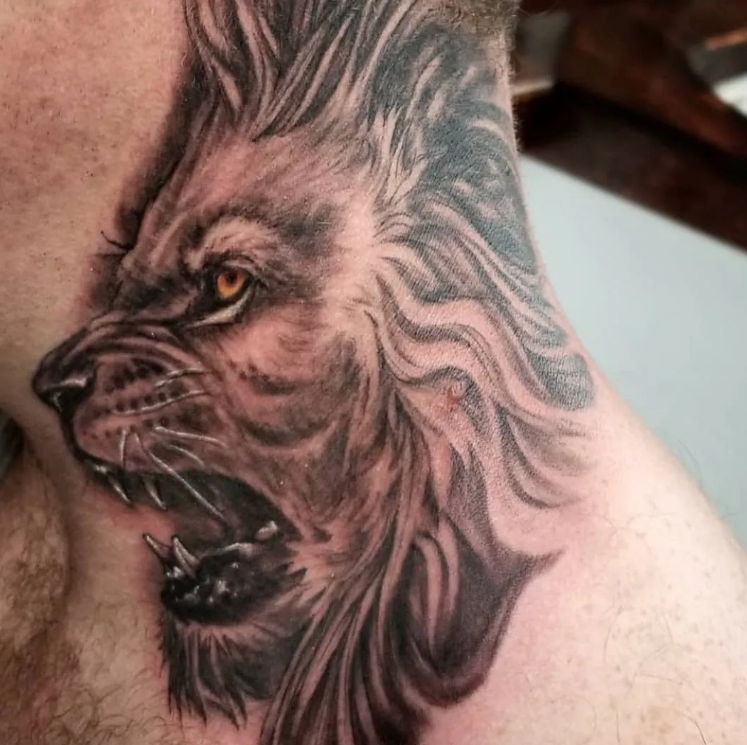 21 Terrific Lion Face Tattoo On Neck - Psycho Tats
