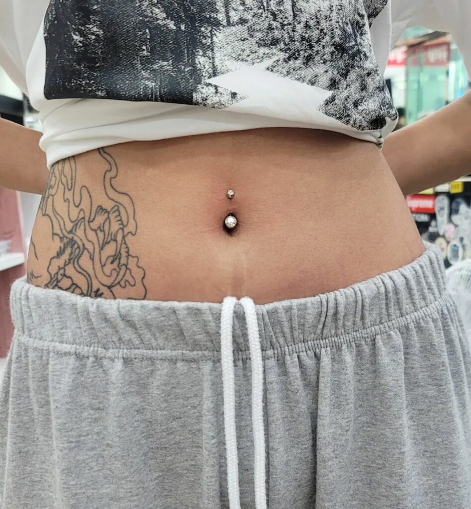 Can You Swim With A Belly Button Piercing? Psycho Tats