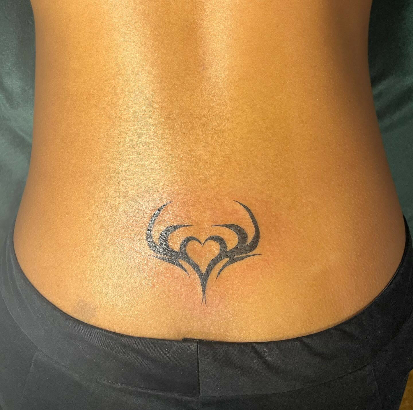 32 Tramp Stamp Tattoos That Will Turn Heads - Psycho Tats