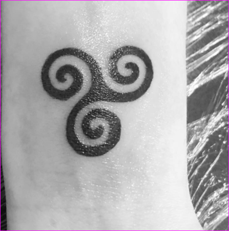 15 Triskele Tattoo Art Designs That Embrace The Power Of Celtic 